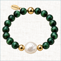 Teramasu Luxury Gratitude bracelet featuring green tiger's eye beads, a baroque pearl, and gold-filled beads.