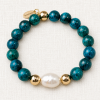 Luxury handmade Chrysocolla and baroque pearl bracelet with gold-filled accents by Teramasu on a light linen background.